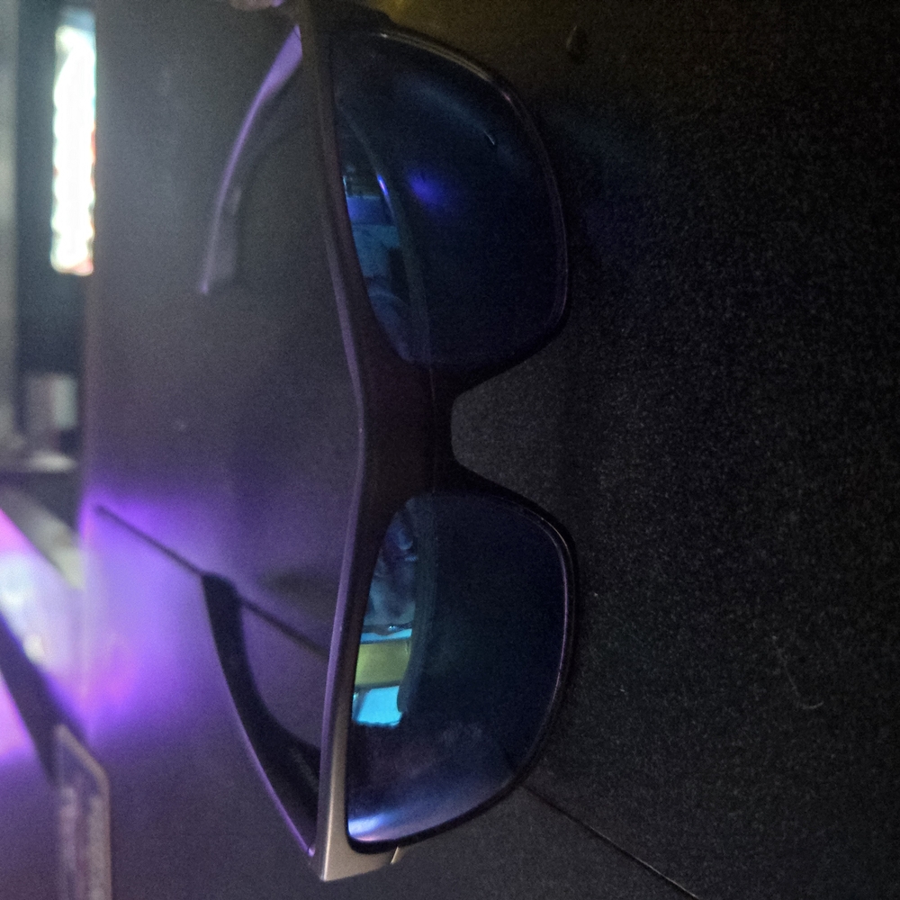 Stylish Black Sunglasses with Blue Lenses